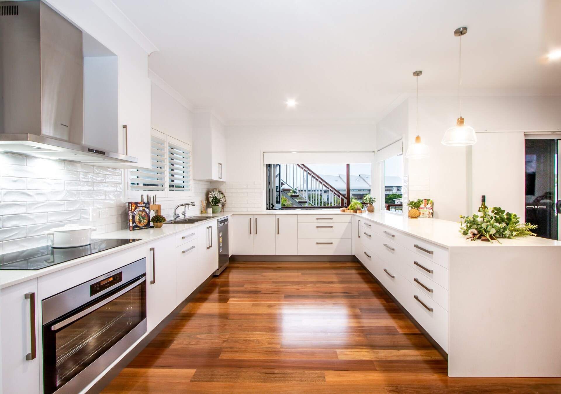 A House With a Lot of Windows and a Balcony — Regalline Cabinets & Joinery in Svensson Heights, QLD