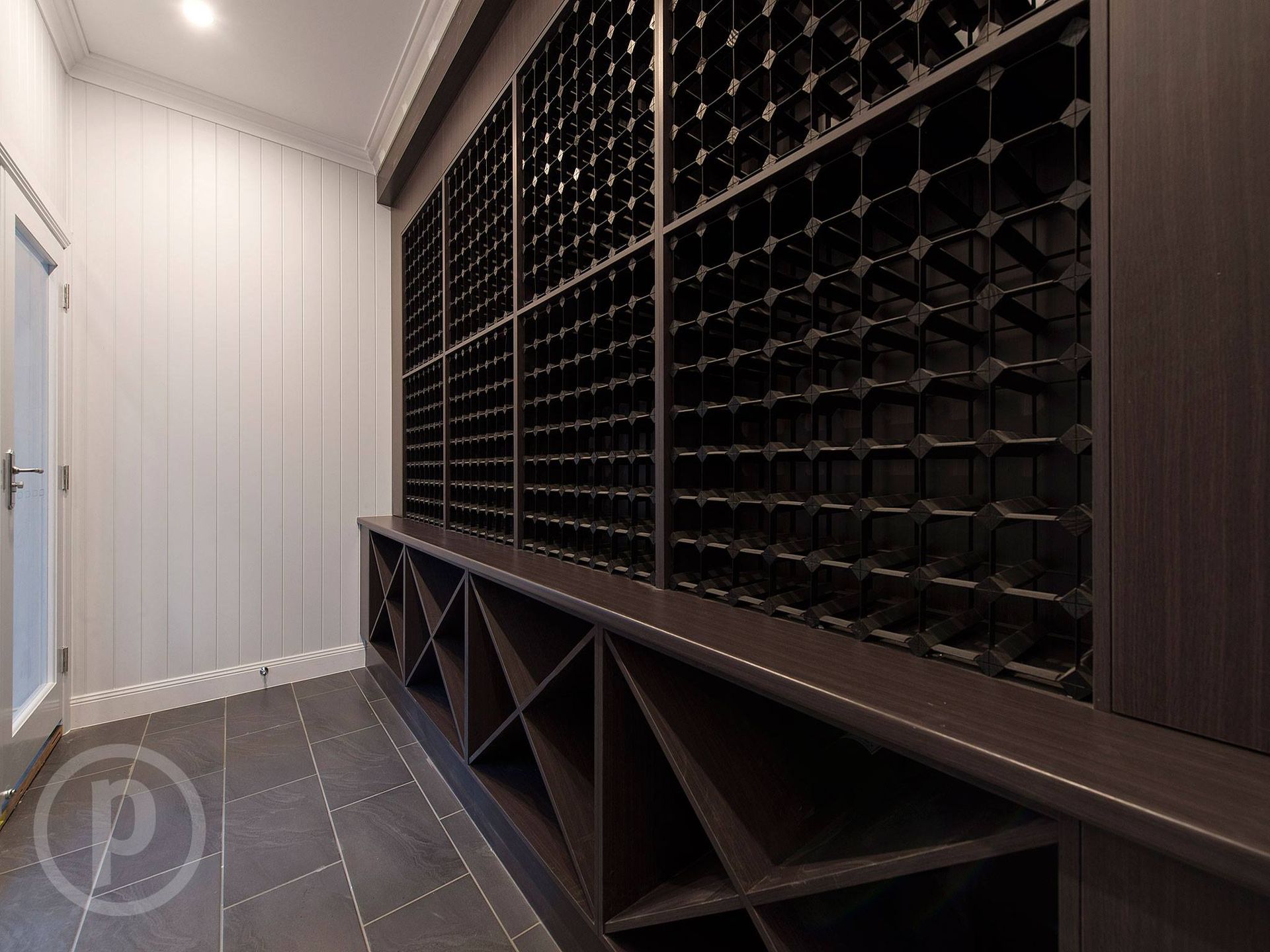A Living Room With Yellow Walls and a Flat Screen Tv on a Wooden Stand — Regalline Cabinets & Joinery in Svensson Heights, QLD