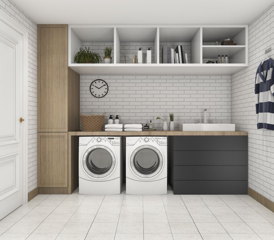 A Laundry Room With Two Washing Machines and a Sink — Regalline Cabinets & Joinery in Svensson Heights, QLD