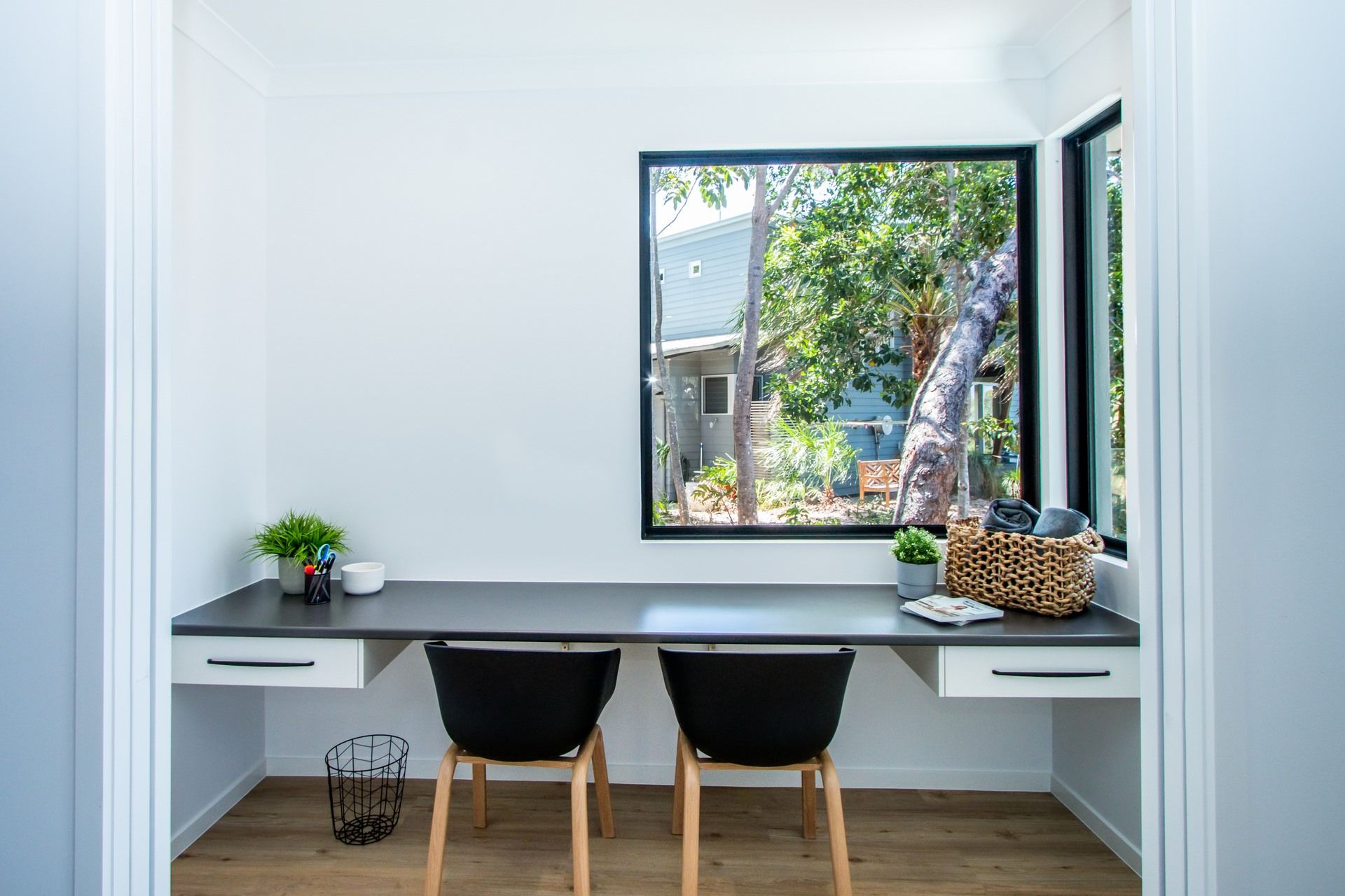 A Walk in Closet With Lots of Drawers and Shelves — Regalline Cabinets & Joinery in Svensson Heights, QLD