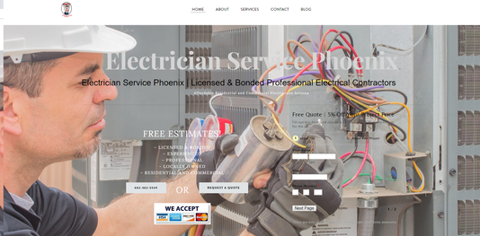 A man wearing a hard hat and gloves is working on an electrical box.