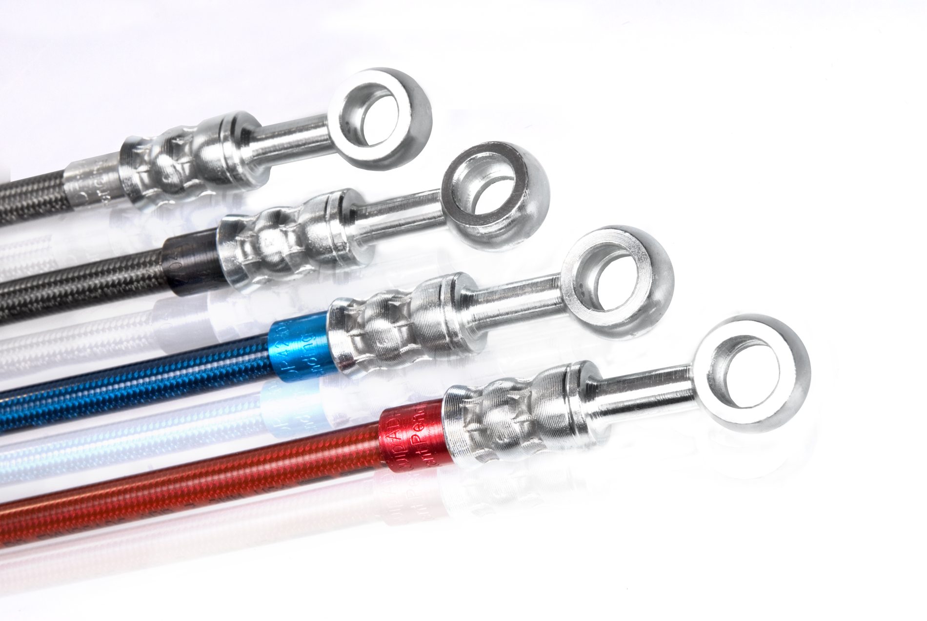 Four braided metal brake lines with silver fittings, two silver, one blue, and one red.