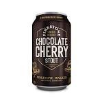 Can of chocolate cherry stout beer with dark label and large white text