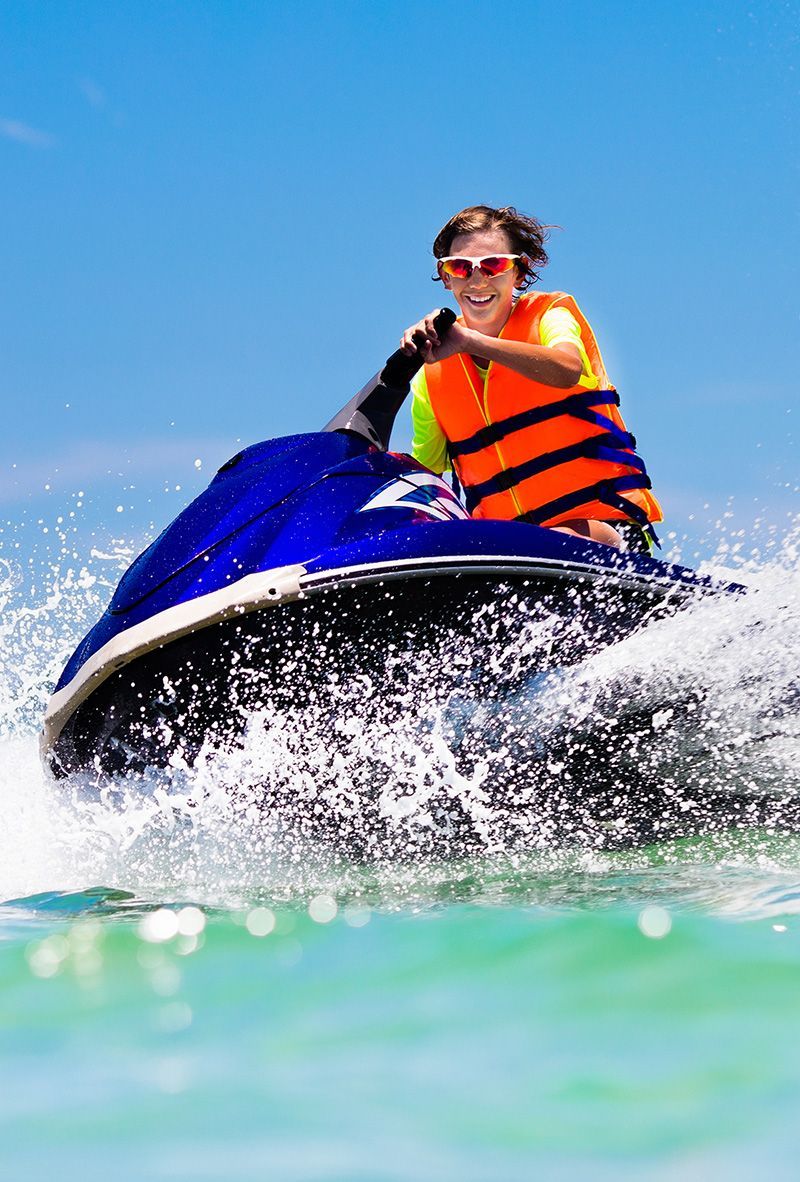Man Riding A Jet Ski