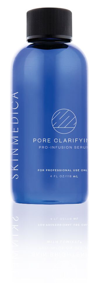 Blue bottle of SkinMedica Pore Clarifying solution. White text and logo on the bottle. Black cap.