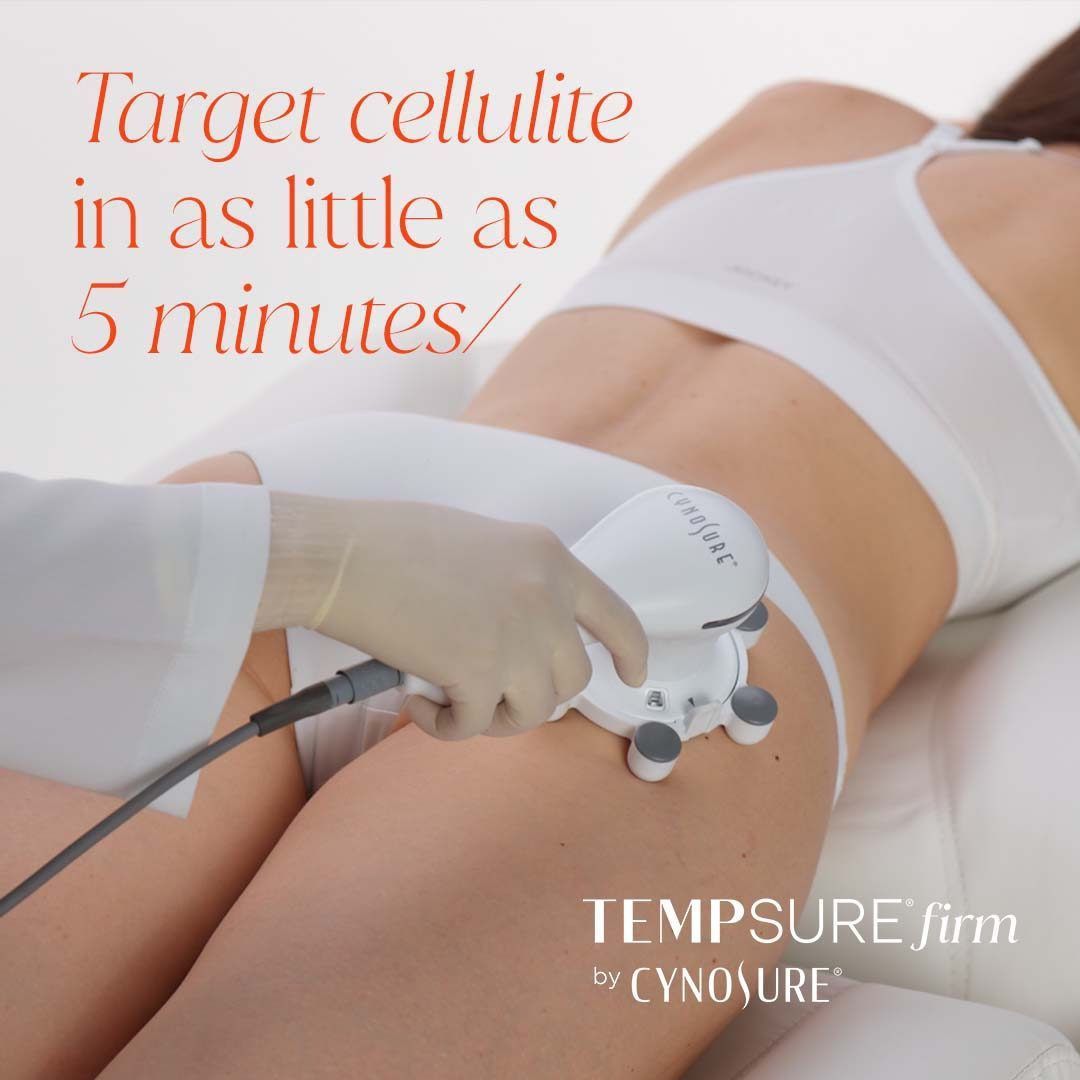 Woman receiving cellulite treatment on hip with Tempsure Firm device.