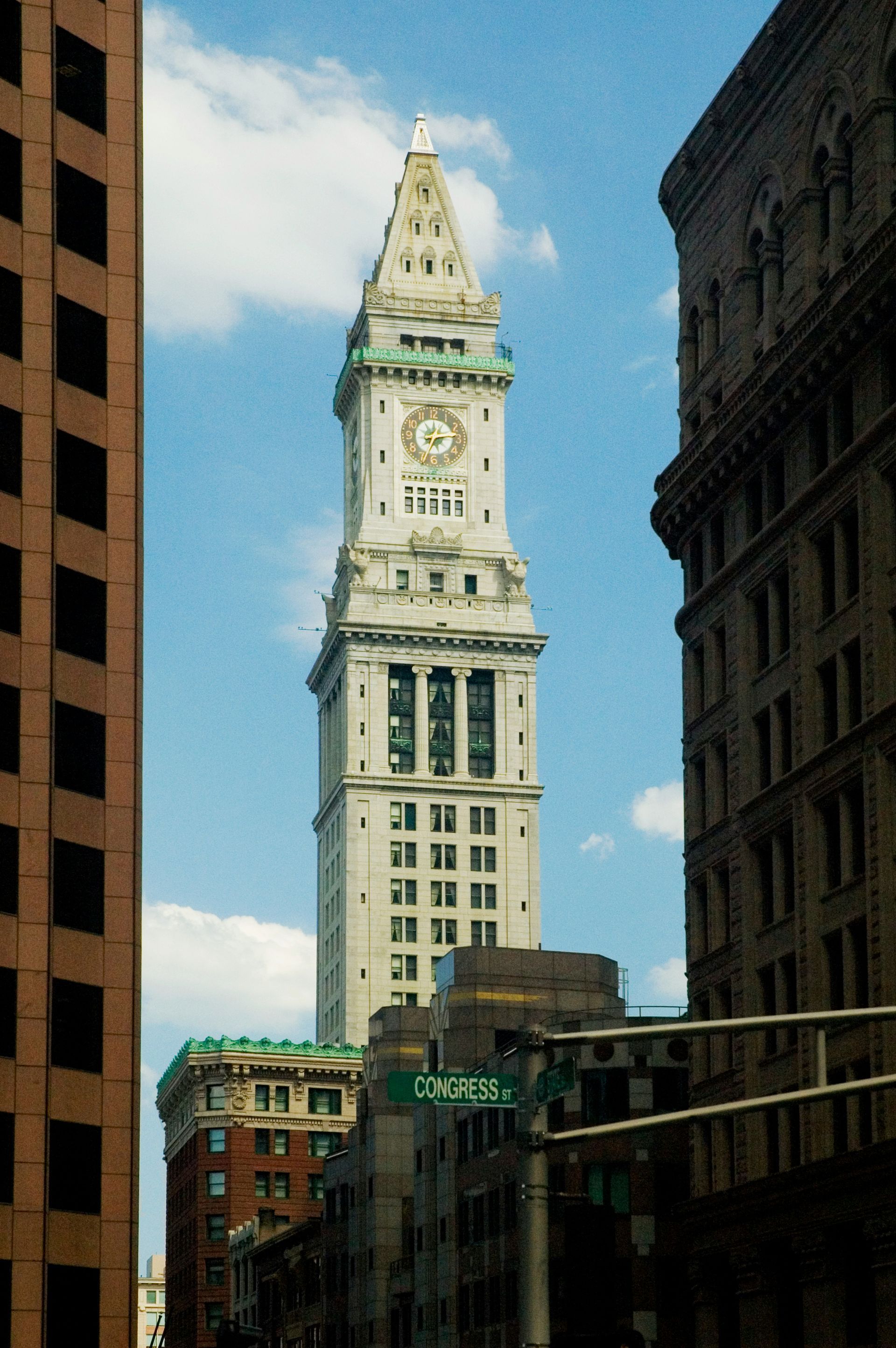 A tall building with a clock on top of it