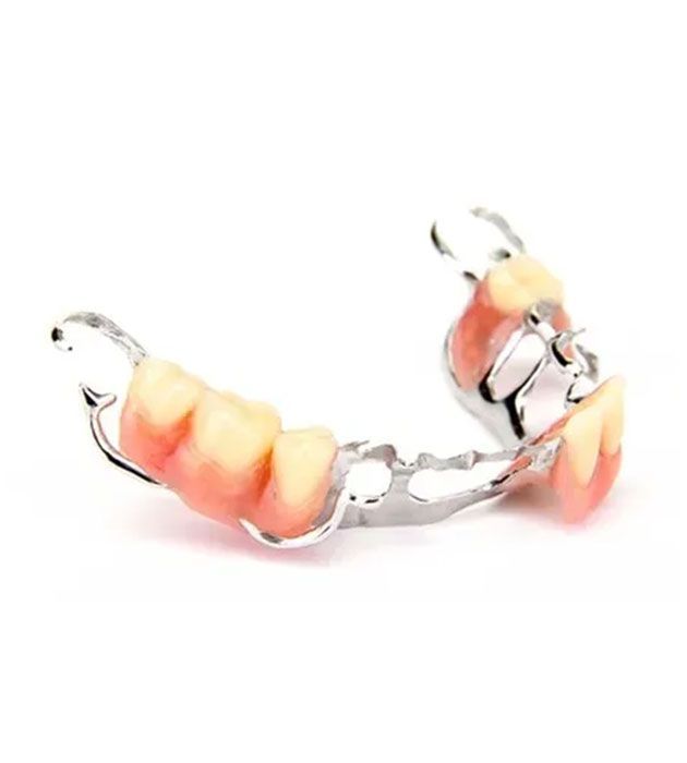 Close Up of a Partial Denture on a White Background — Cosmetic Denture Services–Jacob Maxwell in Proserpine, QLD