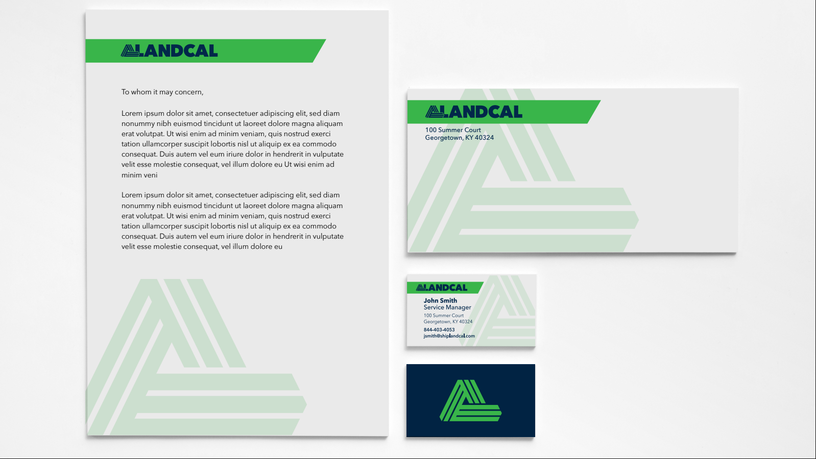 Green-and-white Alandal brand stationery mockup with letterhead, envelope, and business card
