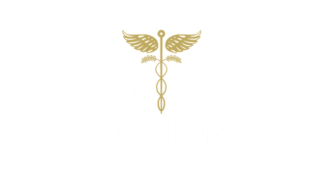 Gold caduceus medical symbol on a white background