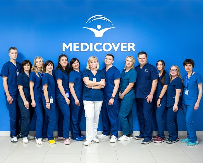 ukrainian medicover fertility team standing together and smiling when looking at the camera