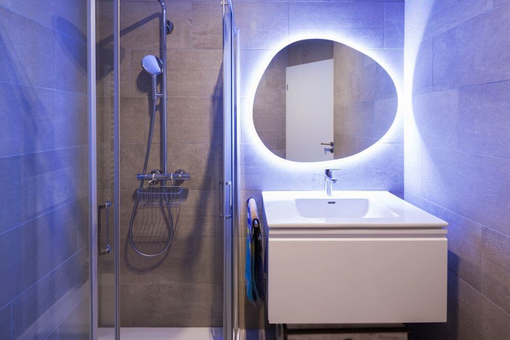 A Bathroom With A Sink , Shower , And Mirror — Cool & Secure In Maroochydore, QLD