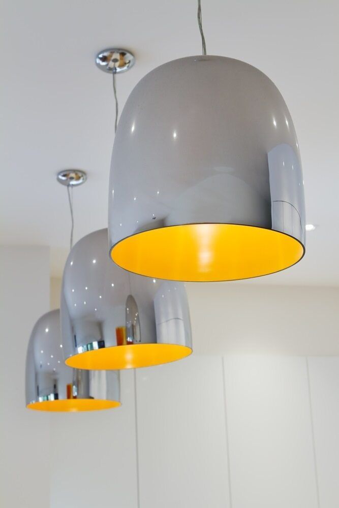 A Row Of Gray And Yellow Pendant Lights Hanging From The Ceiling — Cool & Secure In Maroochydore, QLD