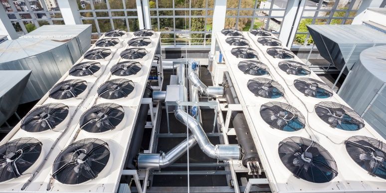There Are A Lot Of Fans On The Roof Of A Building — Cool & Secure In Buderim, QLD