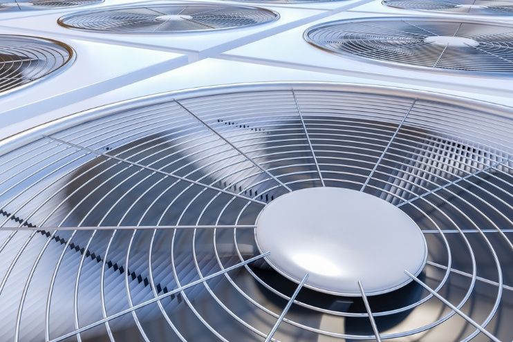 A Bunch Of Air Conditioner Fans Are Sitting On Top Of Each Other On A Ceiling — Cool & Secure In Noosa, QLD