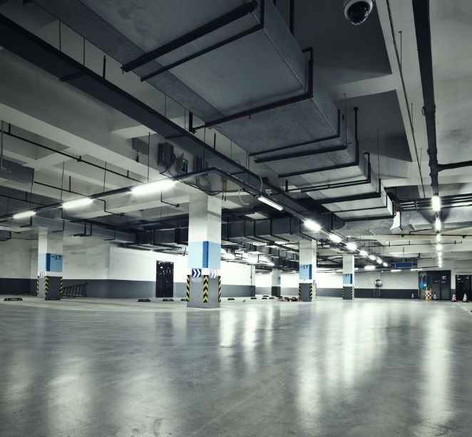 An Empty Parking Garage With A Sign That Says ' A ' On It — Cool & Secure In Warana, QLD