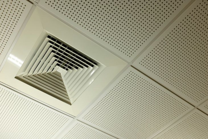 A Close Up Of A Ceiling Vent With Holes In It — Cool & Secure In Buderim, QLD