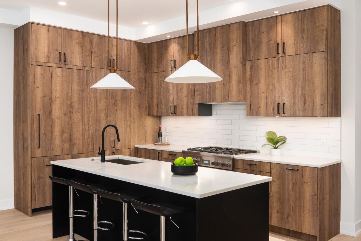 A Kitchen With Wooden Cabinets and a Black Island — Lennox Build In Alstonville, NSW