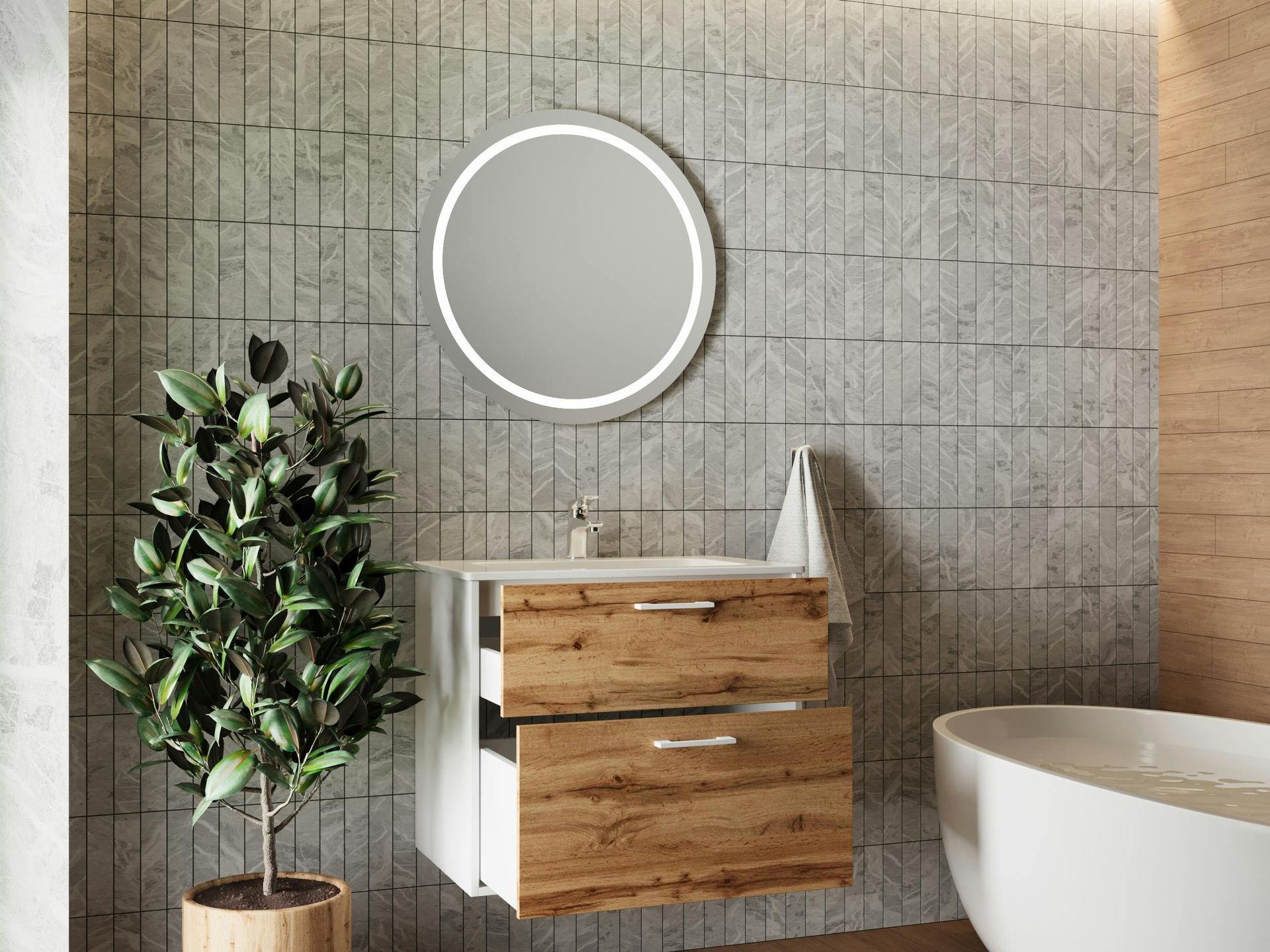 Bathroom with wood vanity, round backlit mirror, and potted plant. White tub in the background.