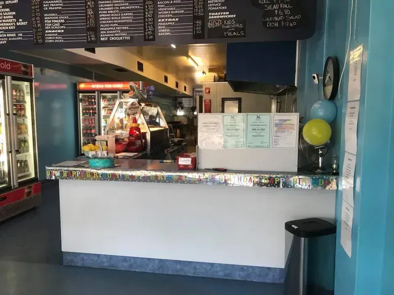 An Interior View of A Fast Food Takeaway Shop with A Menu Board — Sav's Takeaway In Mount Isa, QLD