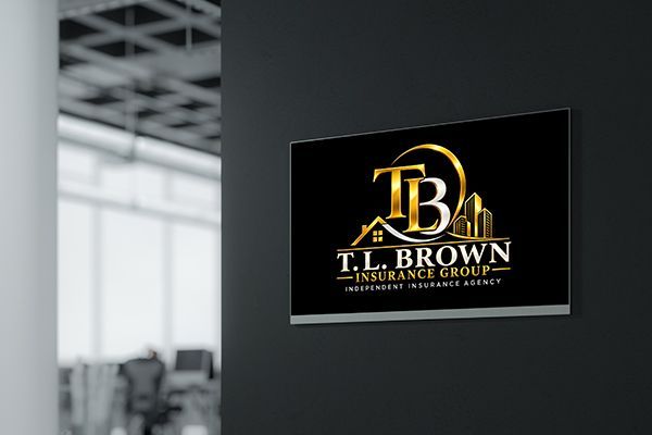 T.L. Brown Insurance Group logo on a black wall sign in an office hallway