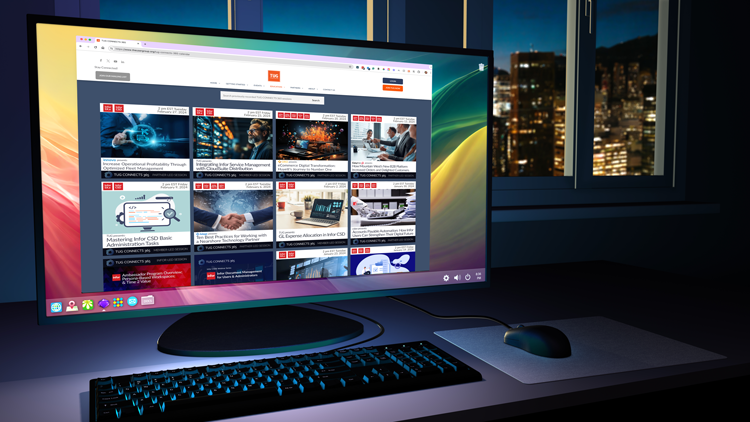 Desktop computer displays a webpage with various thumbnails; keyboard, mouse, and window with city lights in background.