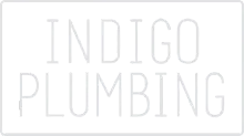 Logo reading “INDIGO PLUMBING” in light gray on a white background