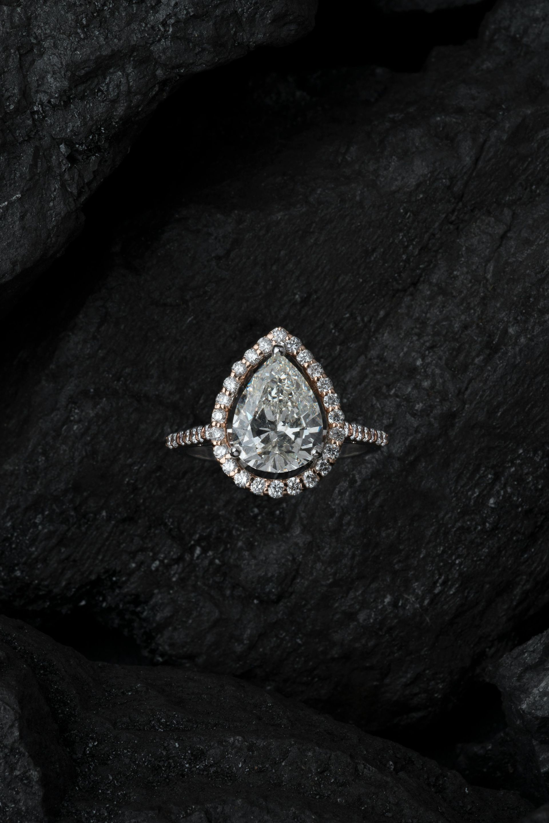 Pear shape halo engagement ring.