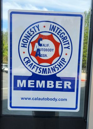 Blue and white Cal Auto Body member sign with honesty, integrity, and craftsmanship emblem | Tripp's Auto Body