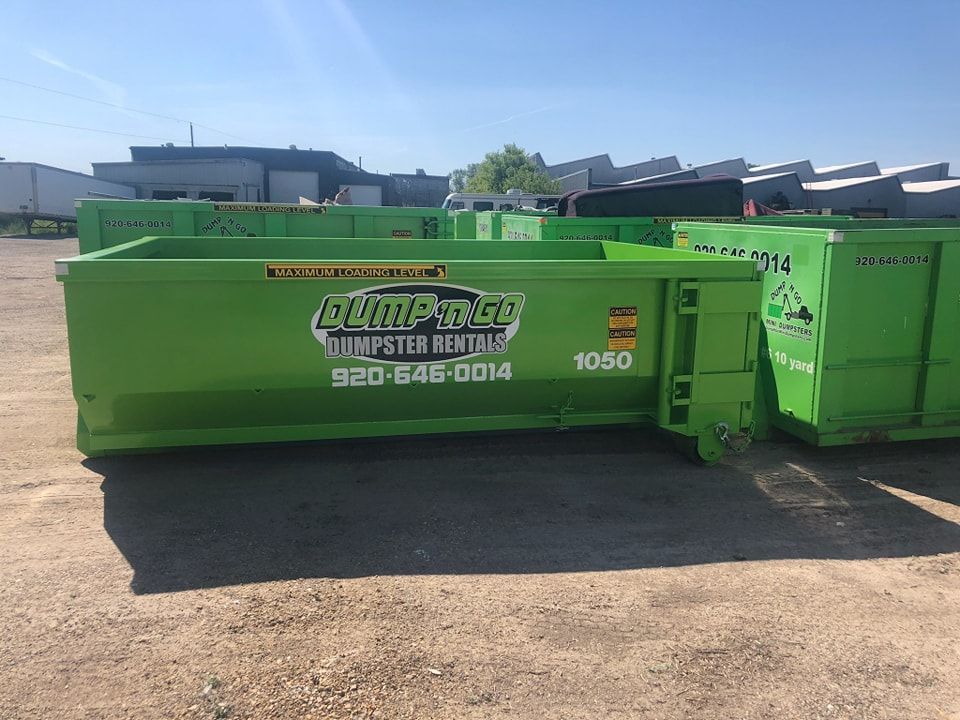 Green dumpster with 