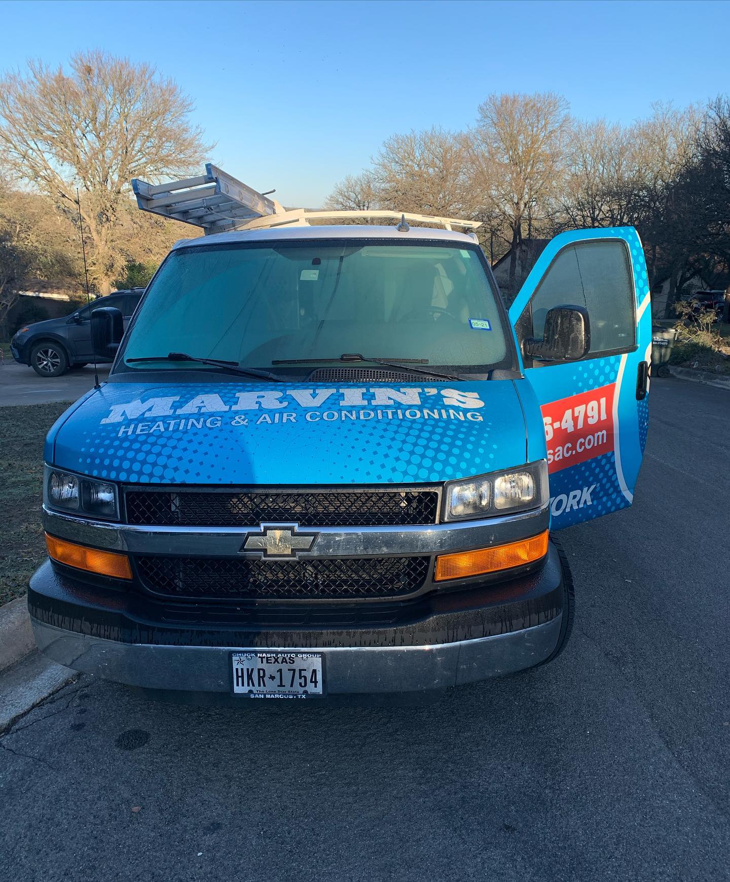 Marvin's Heating & Air Conditioning van, front angle