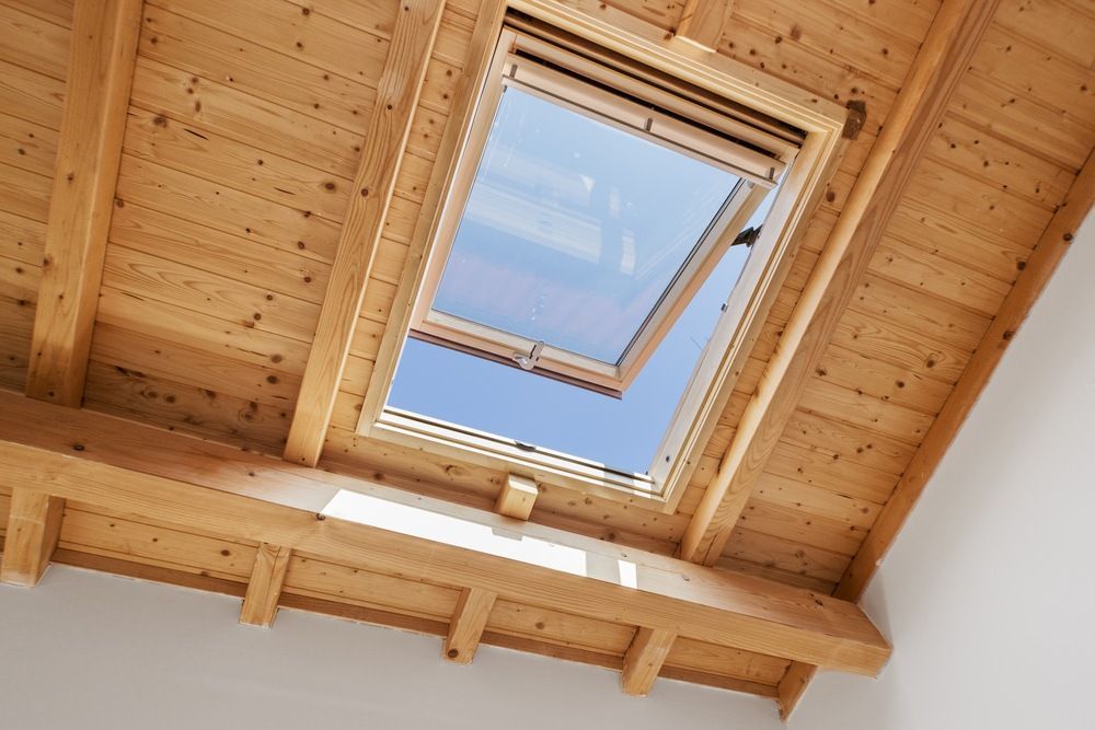A Wooden Ceiling With a Skylight in the Middle of It — Burnett Home Energy Centre in Bundaberg Central, QLD