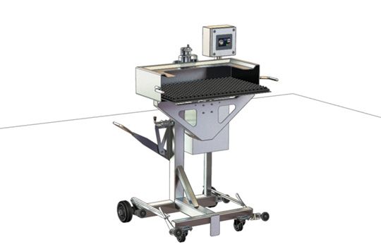 A machine with a monitor on top of it
