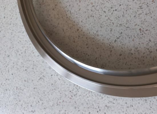 A close up of a metal ring on a counter top