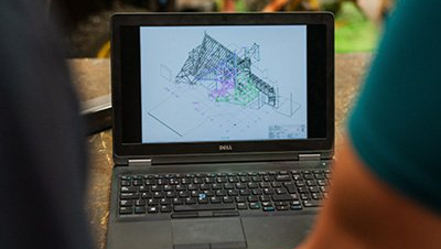 Mechanical engineer working on laptop