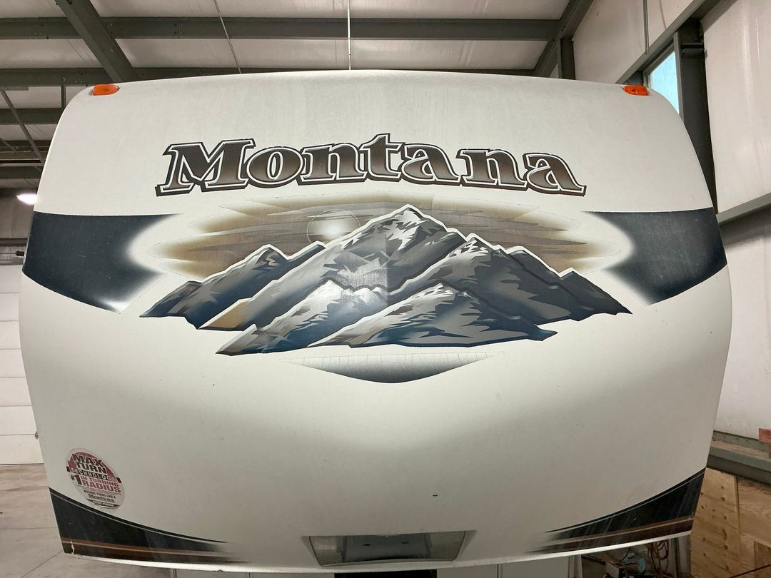 Motorhome awning at night with string lights