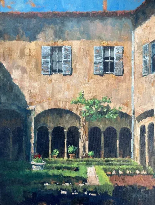 Sunlit courtyard with arched walkway, blue shutters, and potted greenery in a rustic building