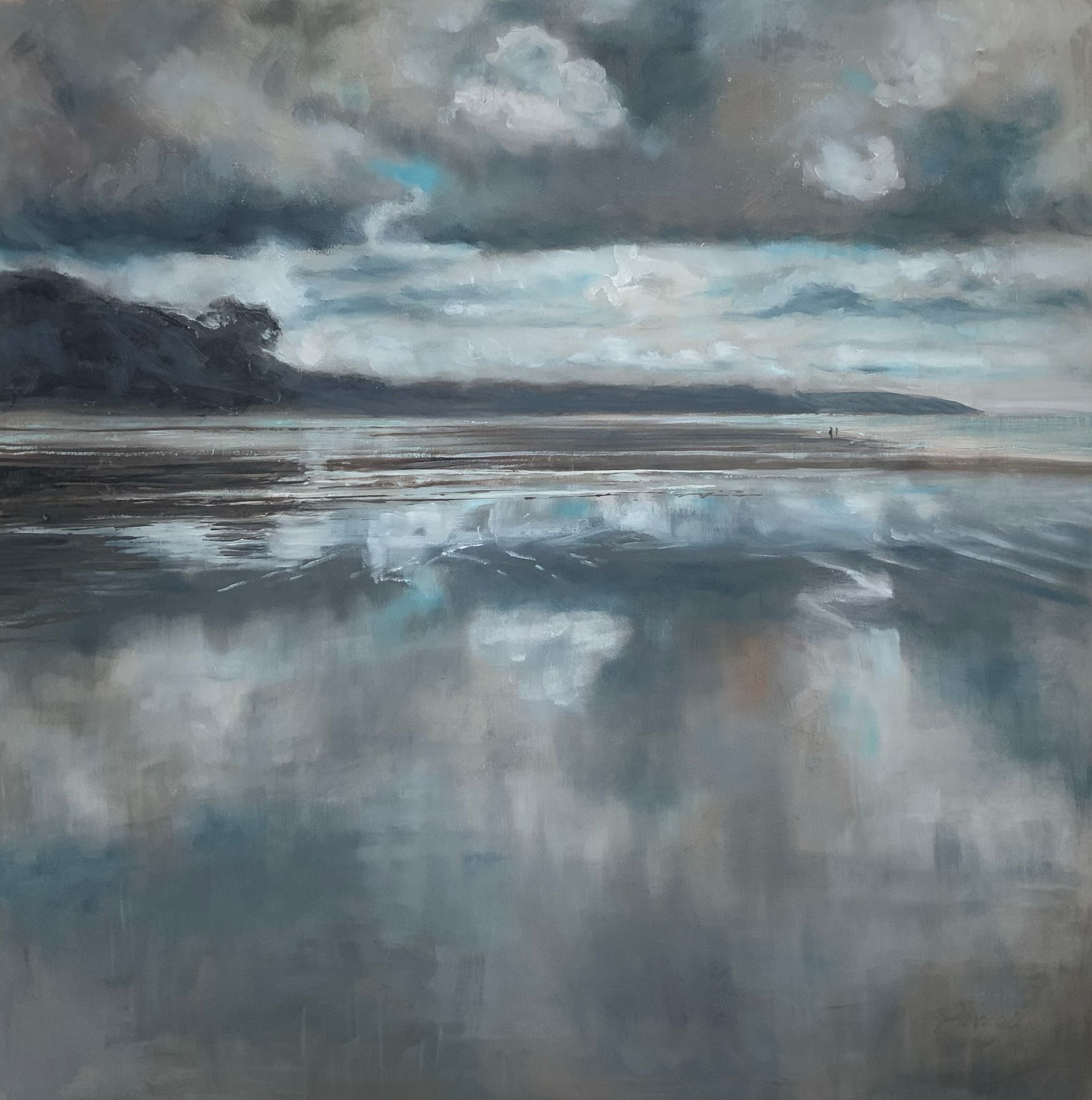 Moody seascape with dark clouds, a distant shoreline, and reflections on calm water