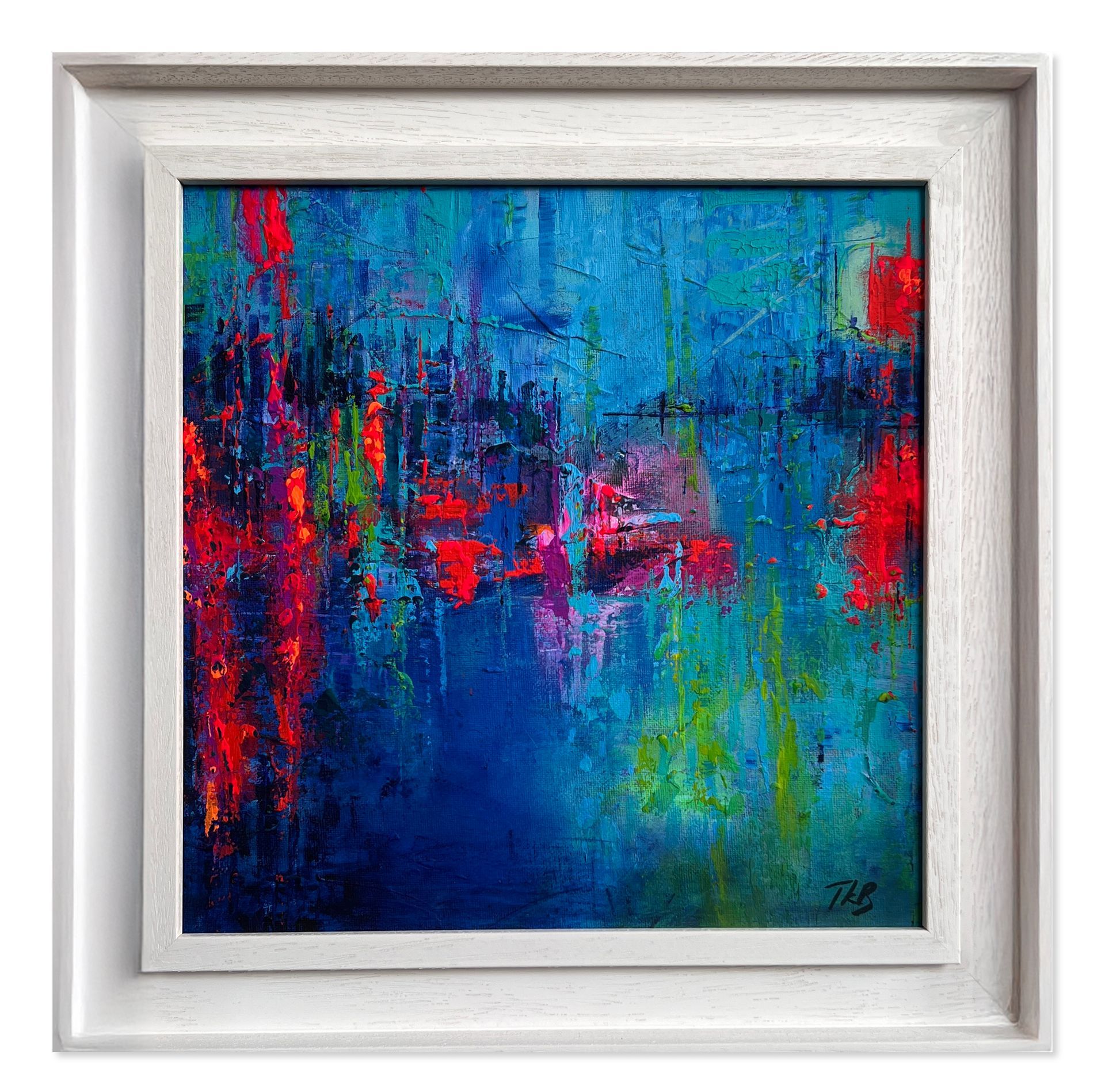Abstract blue, red, and green painting in a white frame