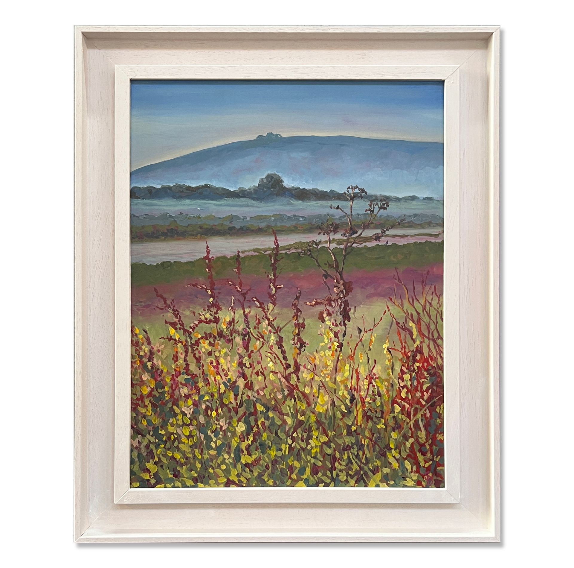 Framed landscape painting of a misty mountain above colorful wildflowers and fields