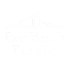 Faint logo with a stylized roofline and barely visible text on a white background
