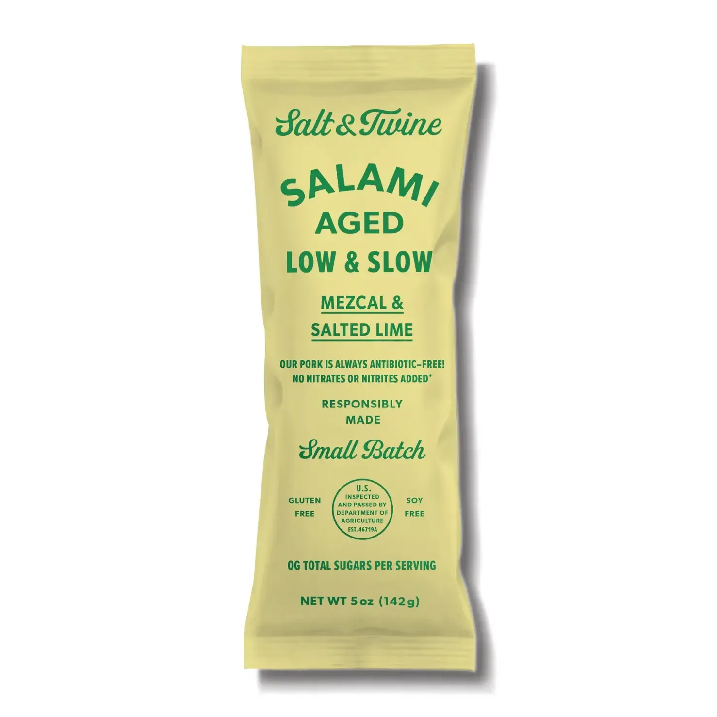 Salami stick in a light-yellow package. It is labeled