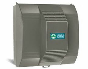 A grey, wall-mounted Healthy Climate air filtration unit with a ridged central panel and a teal logo.