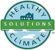 A blue circular logo with clouds, a house icon, and the text