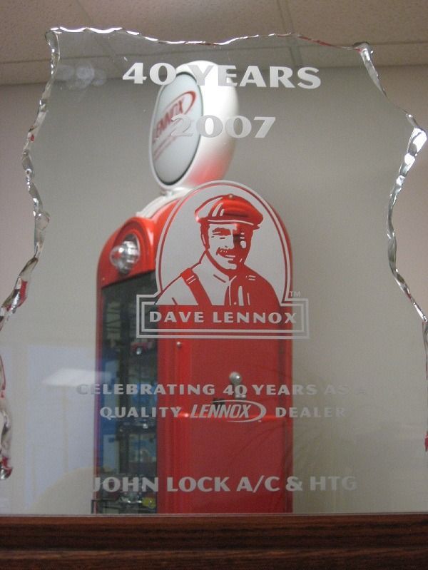 A commemorative glass award for John Lock A/C & HTG, celebrating 40 years as a Lennox dealer in 2007.