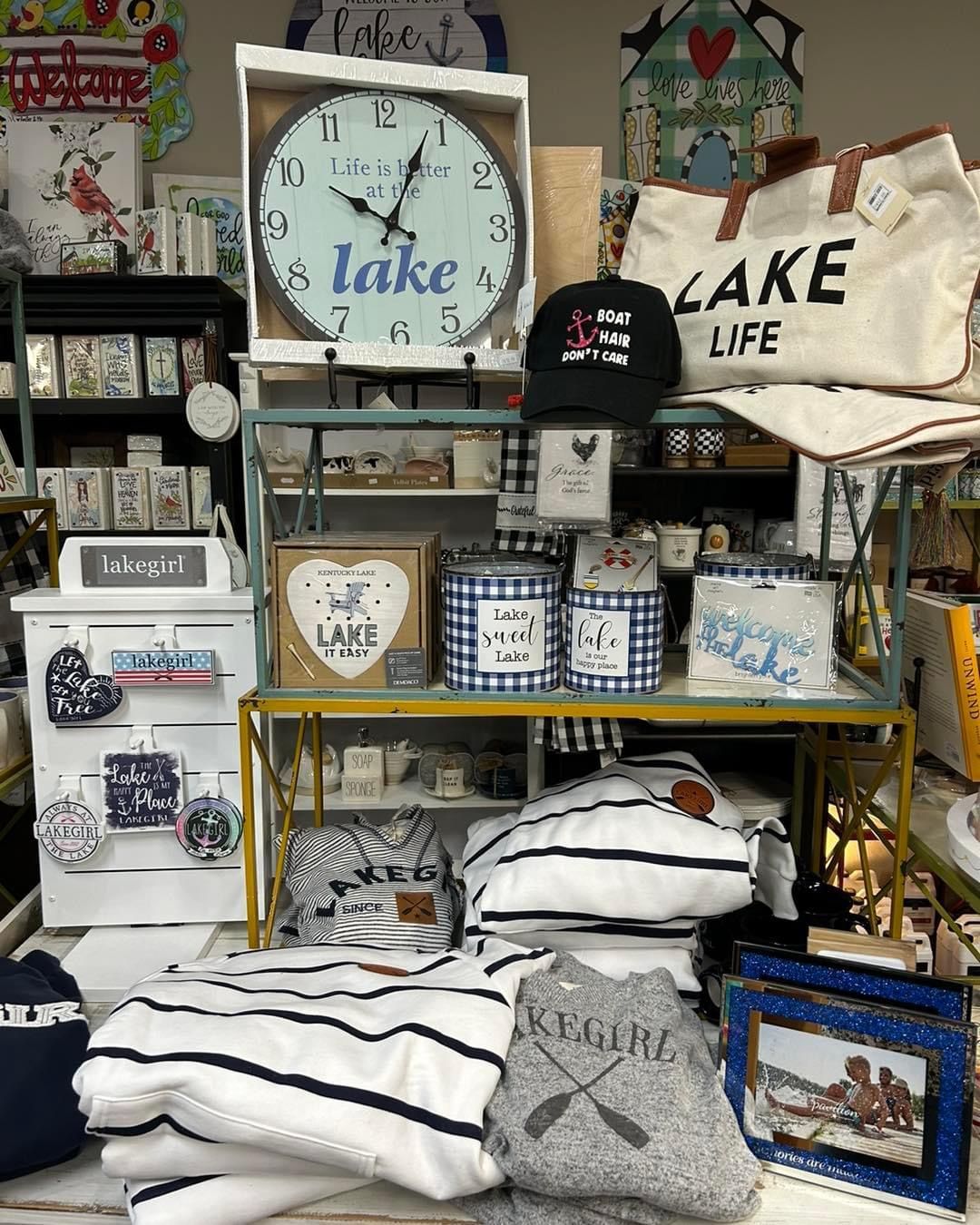A store filled with lots of items and a clock.