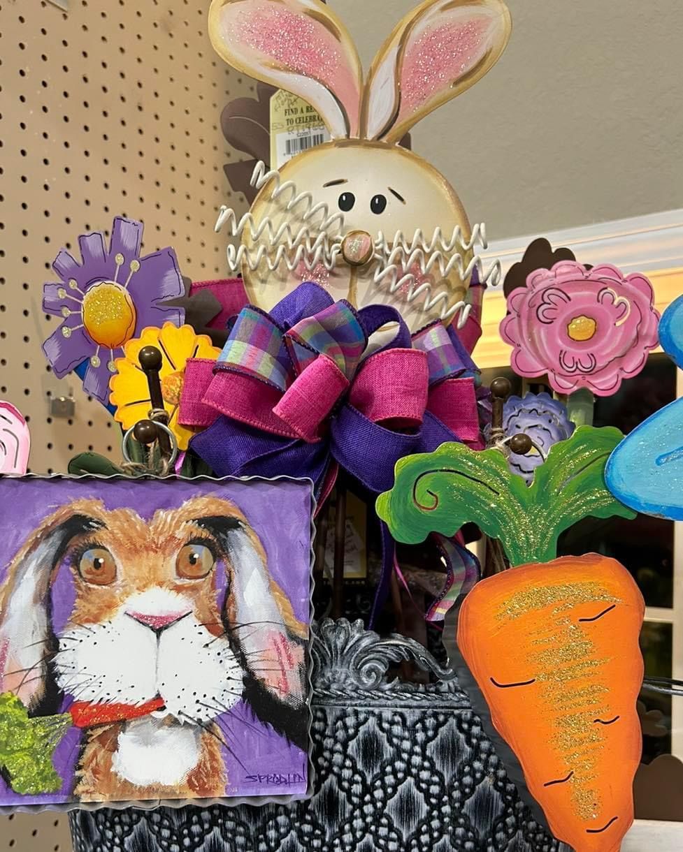 A bunch of easter decorations including a bunny and carrots