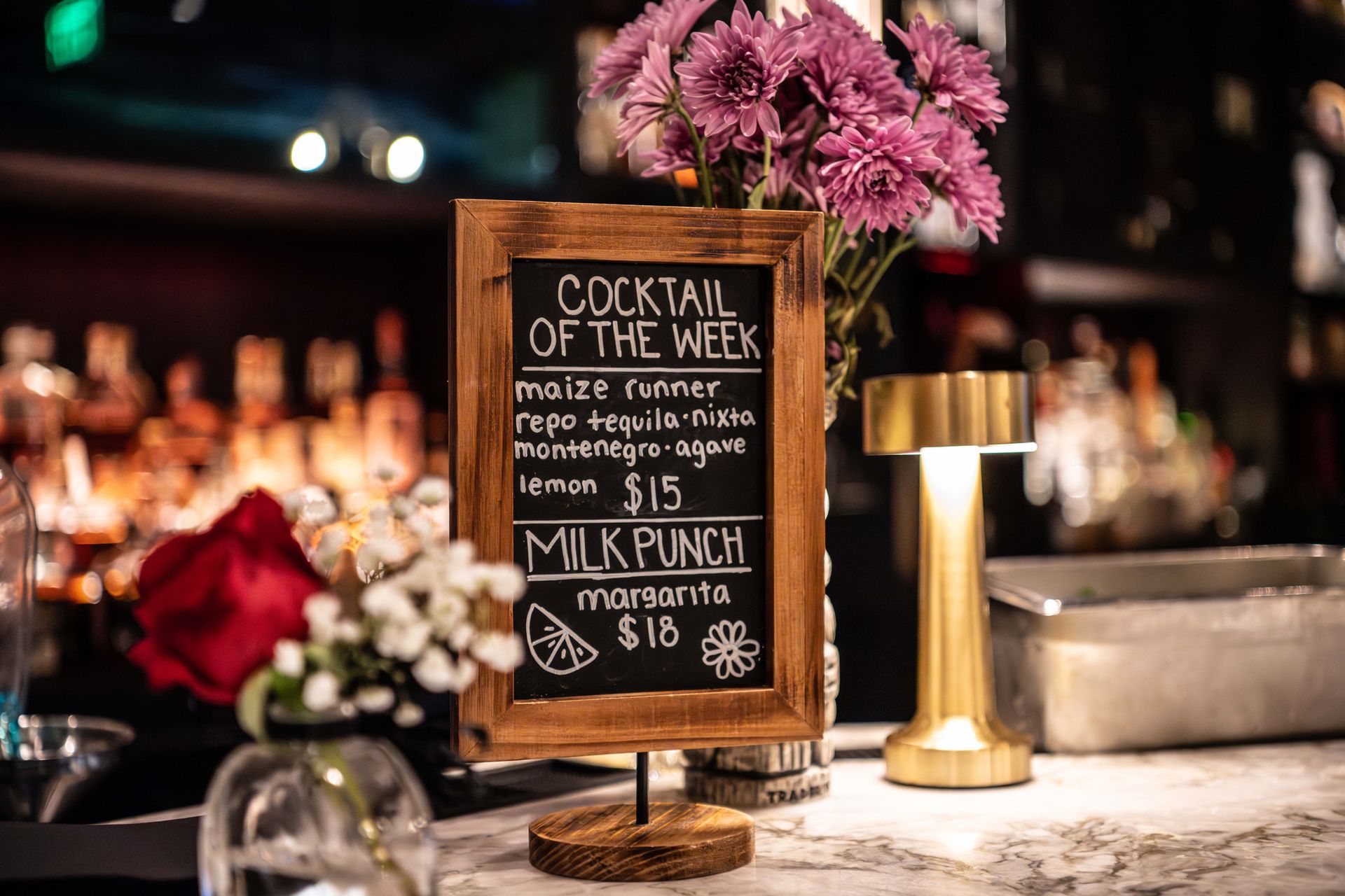 Cocktail menu on bar; 