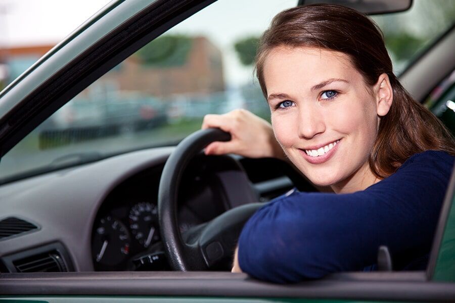 Woman Inside a Car — Carz Driving School in Rockville, QLD