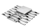 Silver metal integrated circuit chip with pins on a white background